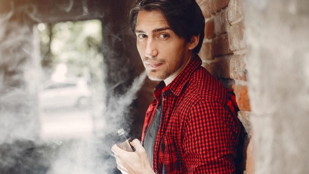 Young Man Vaping.